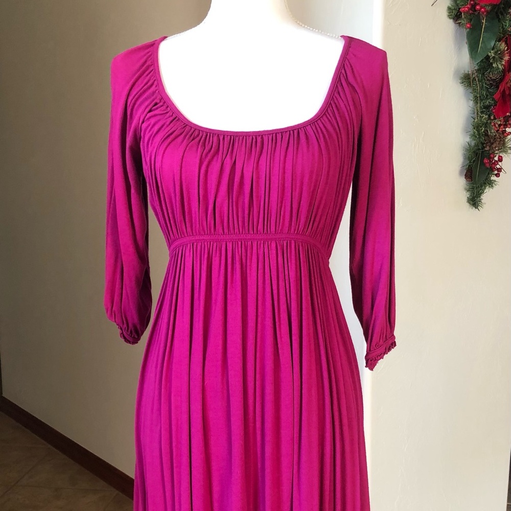 Comfortable flowing fuschia dress. Great for spring or fall weather.